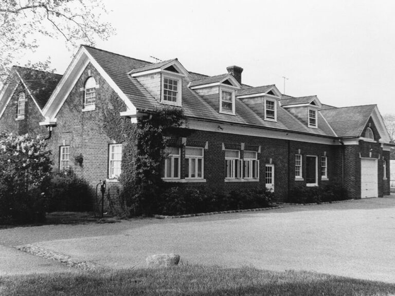 black and white photograph of brick building
