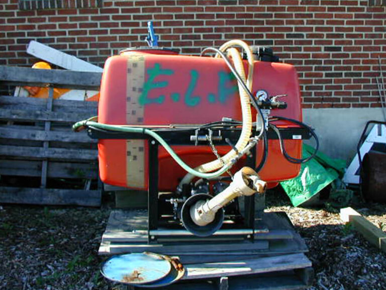 farm equipment with “ELF” spray-painted on the side